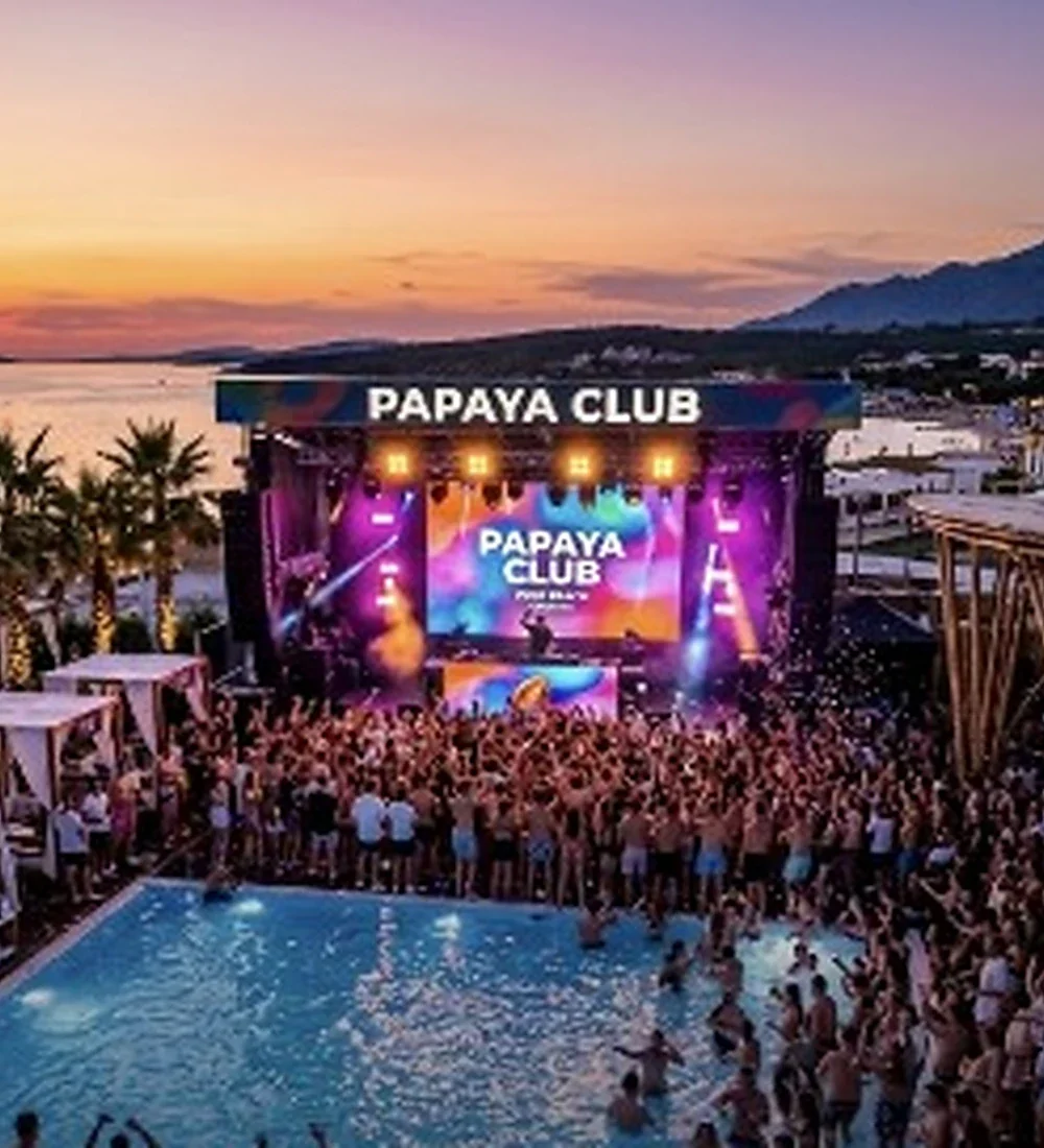 Papaya Club stage, crowd and pool at sunset on Zrće Beach